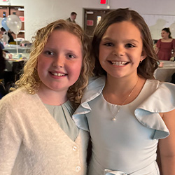 two friends smiling